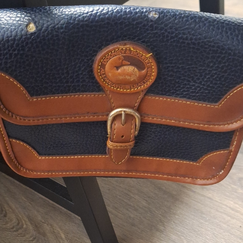Dooney & Bourke Blue and Brown Messenger Bag with Nautical-Inspired Design